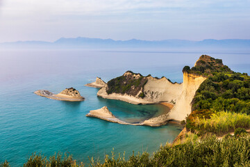 Beautiful view of Cape Drastis in the island of Corfu in Greece. Cape Drastis, the impressive formations of the ground, rocks and the blue waters panorama, Cape Drastis, Corfu, Greece, Ionian Islands.