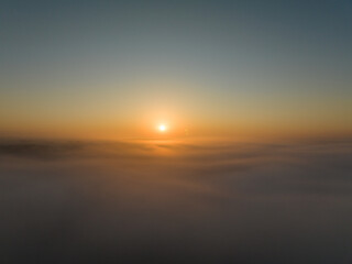 Fototapeta na wymiar Above the clouds at a high altitude