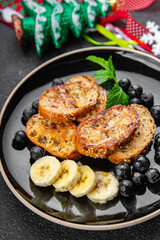 Christmas tasty breakfast sweet toast fruit bread fried in egg baguette piece holiday sweet dessert holiday treat new year and christmas meal food snack on the table copy space food background