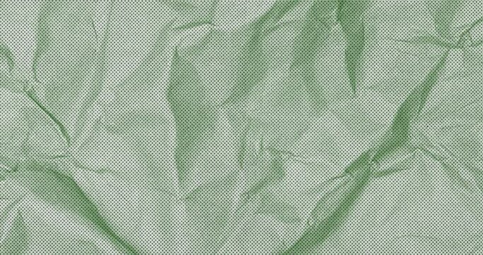 Crumbled paper grungy stop motion animation seamless looped. animation of green color Grunge noise texture of a paper surface stop motion animation.