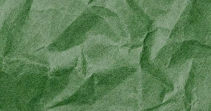 Hard creased Crumbled paper grungy stop motion animation seamless looped. animation of green color Grunge noise texture of a paper surface stop motion animation.