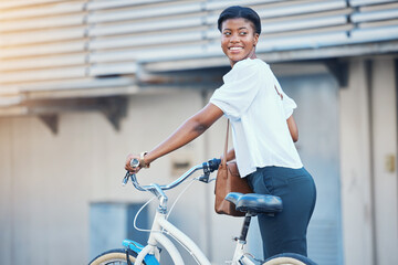 Black woman, bicycle commute and business on road in city with sustainability travel, ride and...
