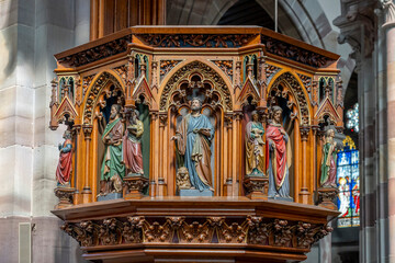 Obraz premium Obernai, France - 09 07 2023: View of a detail inside the Saints Peter and Paul Church.