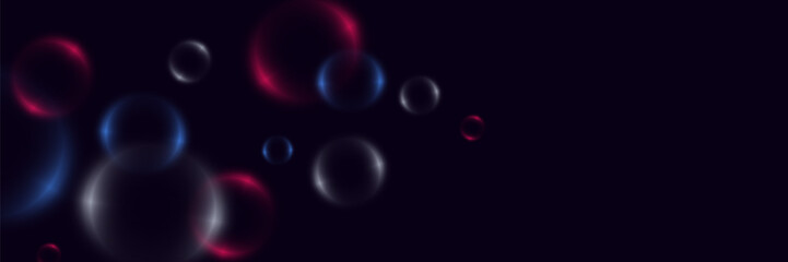 Abstract background with neon bubbles, iridescent colorful glass balls or spheres on a black background.