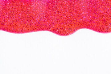 Pink glitter sparkle confetti background liquid drops of paint color flow down on white canvas....