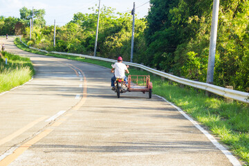 Biker with tricycle on Philippines - obrazy, fototapety, plakaty