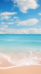 Dreamy beach with blurred ocean waves and sky