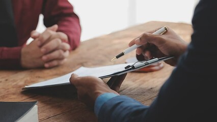 Businessman and Male lawyer or judge consult having team meeting with client, Law and Legal services concept.