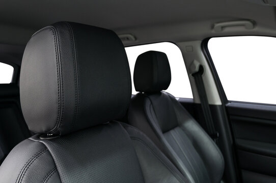 Leather headrest. Modern car interior detail.