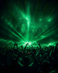A crowd of people in a music event, dancing in green color lights