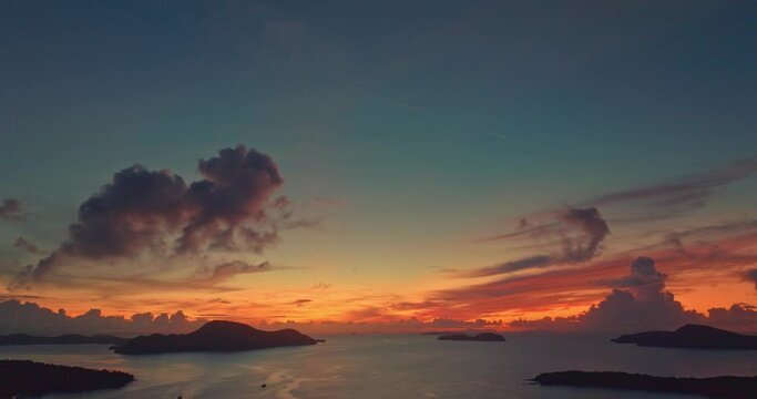 aerial view colorful cloud in stunning sky at twilight above the ocean. Majestic sunset or sunrise landscape Amazing light of nature amazing cloud scape sky and colorful clouds moving away rolling.
