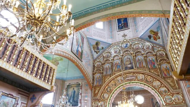 Interior, architecture of the Orthodox church with painting, iconostasis and panikadylo.
