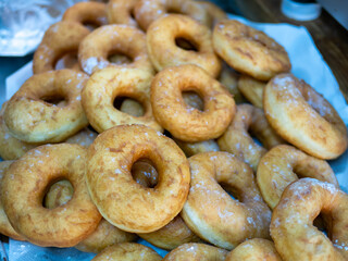 Glazed donuts background image. Macro with shallow dof.