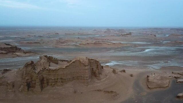 Beautiful nature. Desert. Aerial view. Beautiful desert landscape. Ecological environment. Drought. Problems with water. Global warming. Dramatic geological wonder in the rocky The Lut Desert. Iran