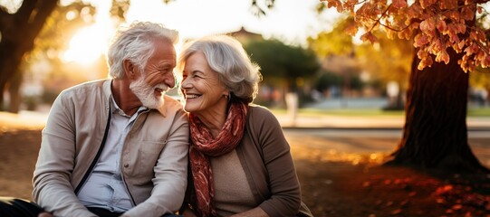 woman man senior couple happy retirement together elderly hug active bonding park outdoor sitting bench leisure fun smiling love old nature wife happiness mature - Powered by Adobe