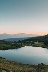 Beautiful mountain lake Vorozheska on Svydovets ridge in the morning. Ukraine. Carpathians.