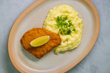 Typical Czech cuisine chicken cutlet with mashed potatoes