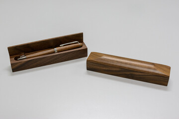 Wooden pen in wood case