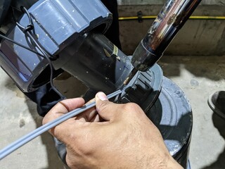 Welding PVC material for rectify leakage on PVC pipe line. The photo is suitable to use for...