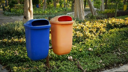 trash cans used to accommodate organic and non-organic waste from city parks