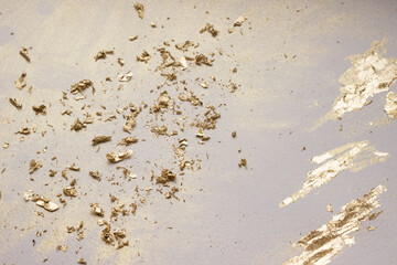 Glowing sparkles on beige watercolor background