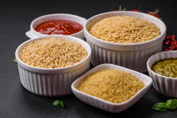 Raw whole grain orzo pasta as an ingredient for a delicious dish