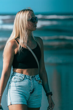 Beautiful Russian girl at the beach during summer