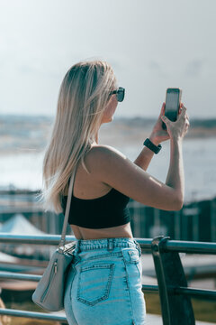 Beautiful Russian girl at the beach during summer