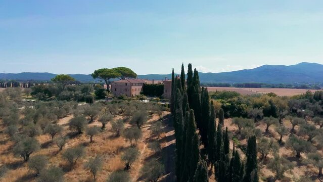 Panorama of the beautiful countryside of the Tuscan Maremma, aerial view at sunset