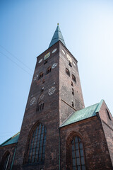 Church tower of the Cathedral of Aarhus, low angle view, vertical shot during clear sky, Denmark