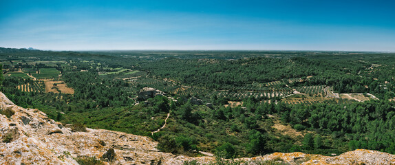 Panorama of the countryside seen on the Alpilles massif. Taken from Les Baux de Provence, Bouches-du-Rhône, France