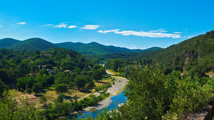 Gardois Landscape Cévennes Valley near Saint Jean. Gard. France. Europe. In the background, the Cévennes mountain range. The opportunity to walk and swim in the roach