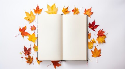 Naklejka na ściany i meble Notebook with autumn maple leaves on white background, top view, mockup, copy space, education concept
