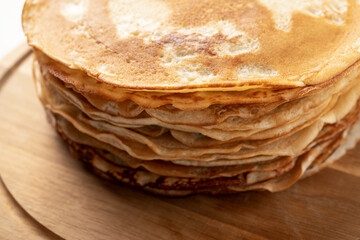 Homemade Crepes pancakes on a plate, top view