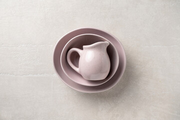 Pottery on a concrete light background, top view, homeware