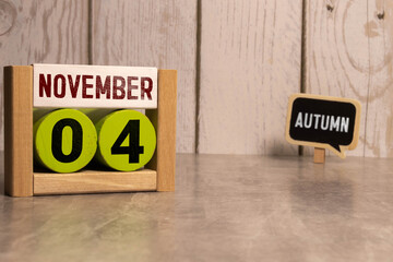 November 4 calendar date text on wooden blocks with copy space for ideas or text. Copy space and calendar concept