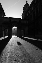 United Kingdom, Glasgow - City of Glasgow in the UK. Bright sunny day, play of light and shadow, illuminated historical part of the city. A cozy old building, the historical heritage of the city