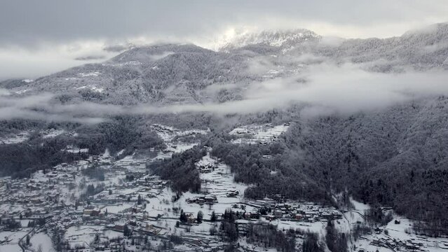 Aerial images of an enchanting and romantic panorama of a snow-covered valley