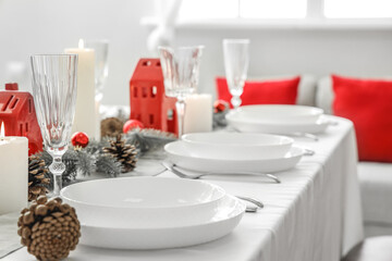 Festive table setting with Christmas decor at home