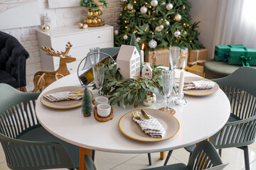 Festive table setting with Christmas decor at home