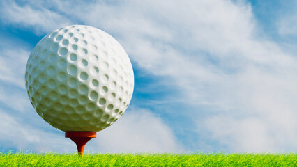 Golf ball on orange stand on short grass ground with blue sky with clouds