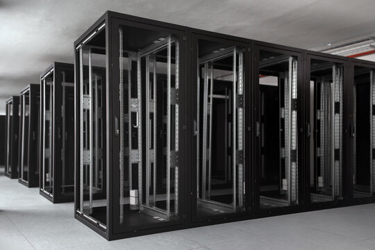 Server racks under construction in a data center hall.