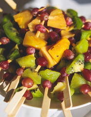 Catering table, beautifully decorated banquet with variety of with different food snacks appetizers on corporate birthday party event or wedding celebration, canape, salad, delicatessen setting