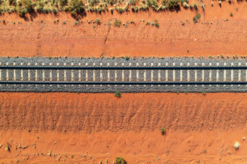 Train tracks passing through the desert in outback Australia