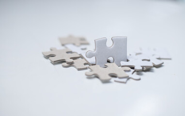Business strategy concept. Business team. Strategic meeting planning. Assembly of jigsaw pieces Using a jigsaw Showing solutions for business people teamwork