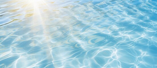 Top down view of a clear swimming pool with a vibrant abstract water texture - obrazy, fototapety, plakaty
