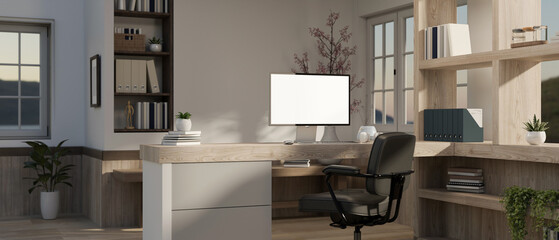 Interior design of a beautiful modern office with a computer on a counter desk and an office chair.
