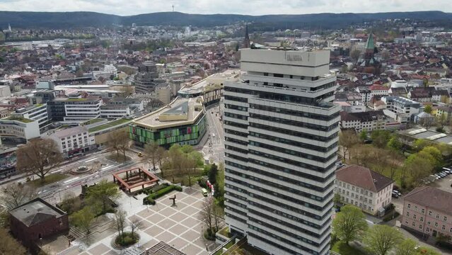 City hall tower, shopping mall and Kaiserslautern downtown skyline cityscape, Germany. Aerial