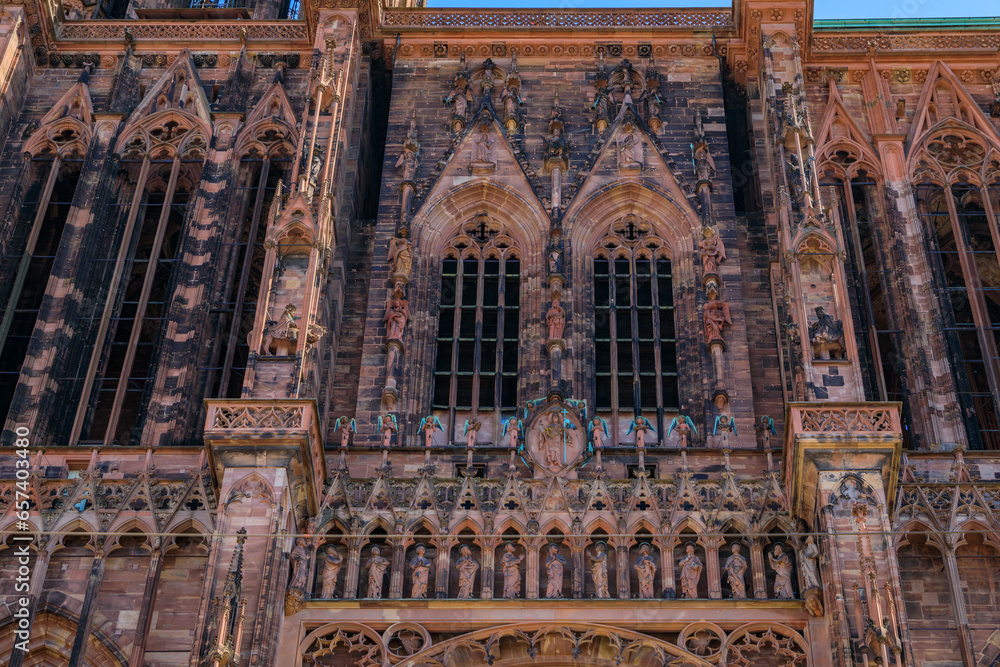 Wall mural ornate gothic facade of the notre dame cathedral in strasbourg, france, one of the most beautiful go