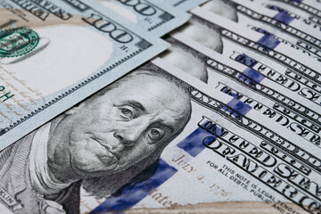 Macro texture banknotes shot close up 100 american dollar bills. Cash money banknotes. Franklin face texture, USD cash macro view.	